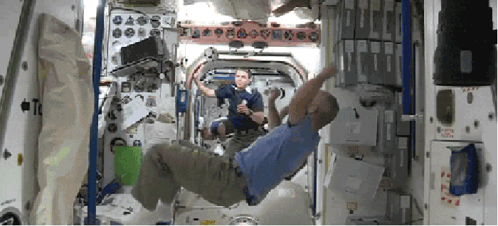 Astronauts playing footie