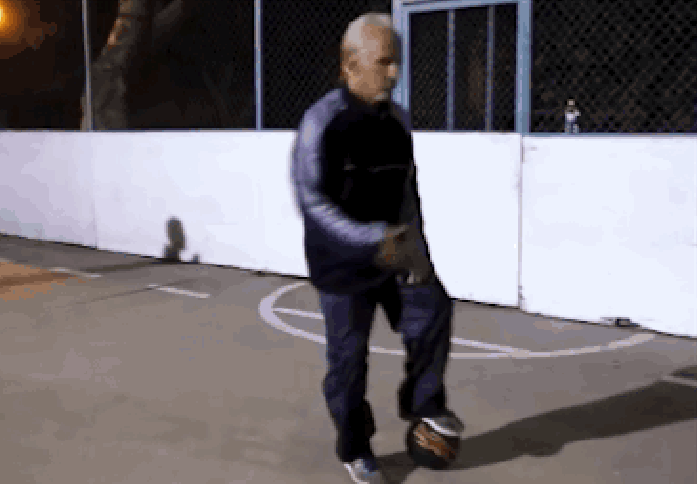 Old man playing football