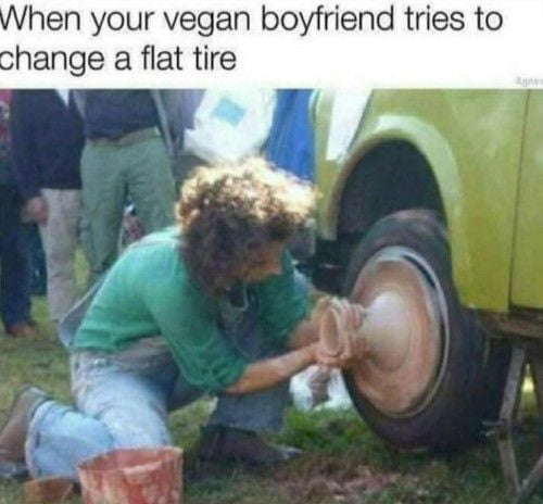 Vegan changing a flat tire