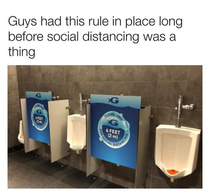 Guys social distancing in toilets