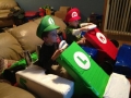Kids playing Mario Kart