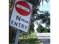 Signs improved by graffiti