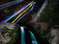 Glow sticks into a waterfall