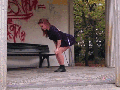 Girl hula hoops on bum