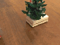 Mouse decorates tree
