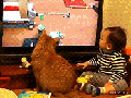 Baby and cat in unison