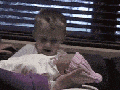 Meeting his baby sister